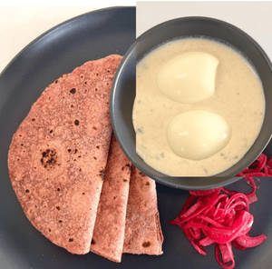 Malai Egg With Beetroot Chapati And Onion Salad