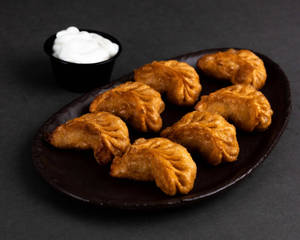 Veg Fried Momos ( 6 Pcs )