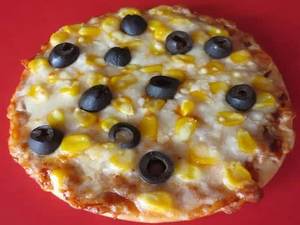 Black olive and corn pizza