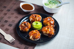 Pork momo pan fry in bbq sauce