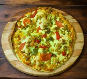 Veg and nonveg loaded pizza