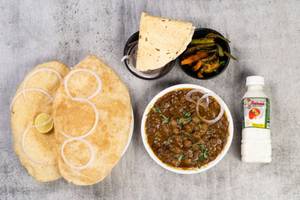 Chole [250ML] + 2 Bhature + Pickle + Salad + Chass + Roasted Papad