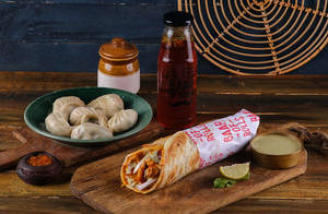Chicken Korma Roll With Chicken Momos & 1 Watermelon Mojito