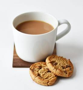 1 Cup  Ginger Tea + 2 Biscuit