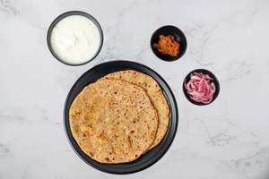 Stuffed Paratha With Curd & Pickle