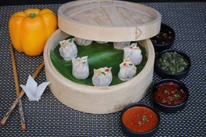 Chicken Cheese And Corn Momos