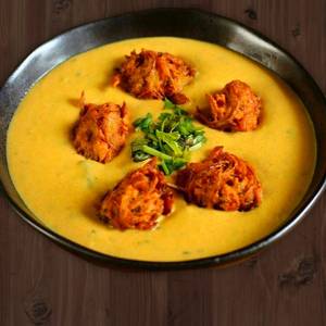 Punjabi kadi with pakoda