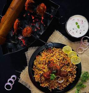 Special Chicken Dum Biryani And Tandoori Leg Piece Combo