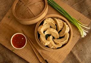 Pork Steamed Momos (8 Pcs)