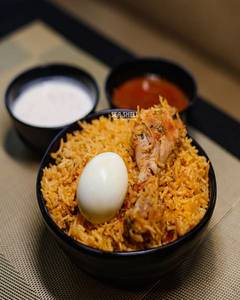 Chicken Dum Biriyani. With Sweet And Soft Drink