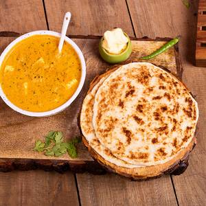 Butter chicken with coconut roti