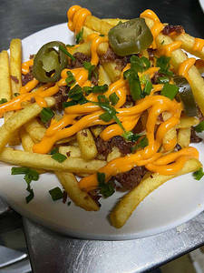 Bacon Cheesy Fries Topped With Jalapeno Cheese