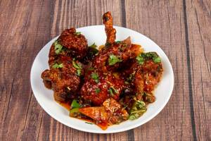 Drumticks Tossed In Schezwan Sauce