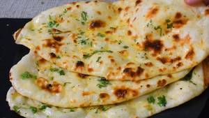 1 Tandoori Butter Naan [Serves 1]