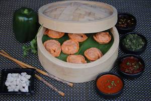 Spicy Schezwan Chicken Steamed Momos