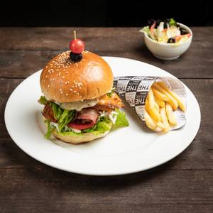 Breaded Chicken Burger With Fried Egg And Bacon