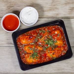 Paneer  Gvy Momos In Man Sauce