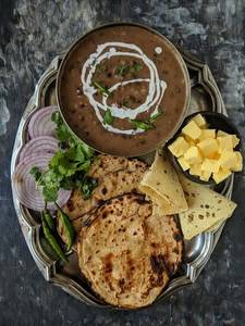 Dal Makhani [ 300 Ml ] + 2 Tandoori Butter Roti + Cold Drink [ 250 Ml ]