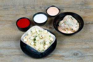 Paneer Lokhra Momos [4 Pieces] with Cheese Gravy Momos [4 Pieces]