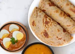 Egg Curry + 4 Butter Roti + Chilli Paneer Dry