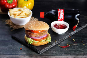 Veggie Burger + 1 French Fries + Coke (250 Ml)