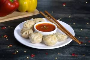Steamed chicken momos [8pcs]                                       