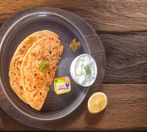 Aaloo prantha + curd,butter,pickle                          