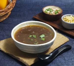 Veg.hot 'n' sour soup .                                                                                                                