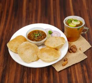 5 Poori + Chole
