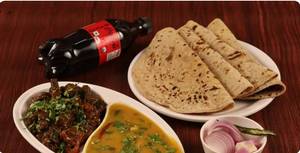 Bhindi Masala + Dal Fry + 4 Tawa Roti + Salad + Coke 250 Ml + Hari Chutney