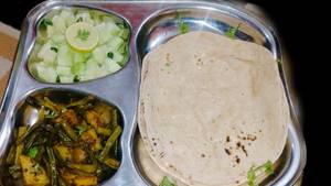 4 Roti + Aloo Bhunjia+salad+achhar