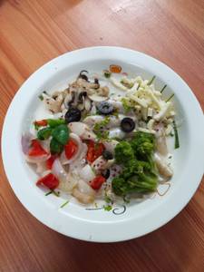 Whole wheat penne alfredo in creamy white sauce and vegetables