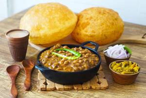 Chole Bhature + Papad + Buttermilk + Mixed Pickle + Onion