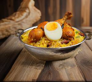 Egg chicken biryani with mint raita