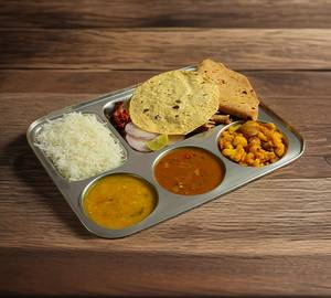 Veg ThaliKadhi paneer+ jeera aloo + 5 soft butter roti  +salad + pickle+papad