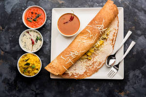 Butter onion cheese masala dosa