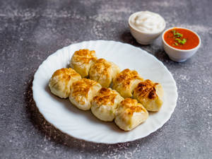 Veg Schezwan Steamed Momos [8 Pieces]