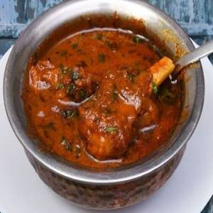 Laal Maas(500ml) With 2 Butter Roti