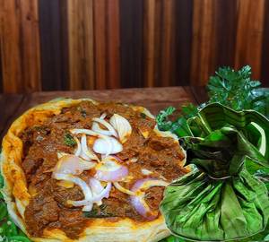 Kizhi Parotta Chicken