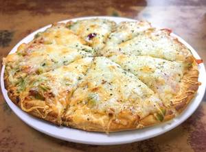 Chatpata paneer pizza