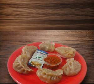 Chicken Schezwan Steamed Momo[5 Pieces]