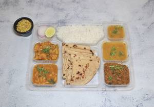 Jalaram Gujarati Thali (jain not available) (2 Veg Sabji + 1 Kathol Sabji + 6 Butter Roti + Dal Rice or Dal Khichidi + 1 Roasted Papad + Salad + Achar + Mukhwas)