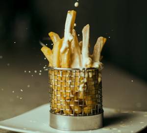 Loaded french fries with cheese sauce