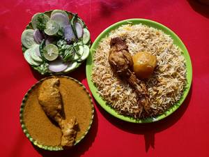 Chicken biryani with chicken chaap [salad]