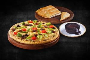 1 Veg Medium Pizza + Free Garlic Bread & Choco Lava (Save Rs 258)