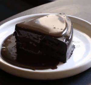 Dark Chocolate Cake W Milk Chocolate Sauce