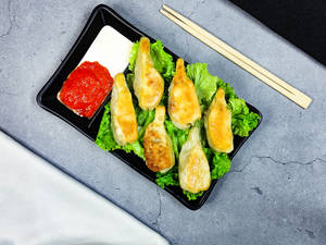 Paneer Buttered Gyoza Momos