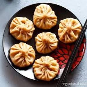 Schezwan Momos [5 Pieces]