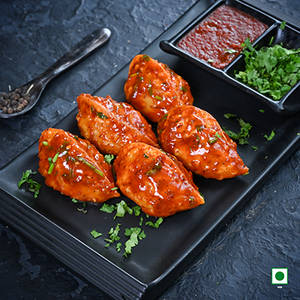 Veg Pahari Fresh Pan Fried Momo in Schezwan Sauce(Spicy)