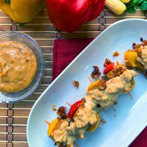 Evolved satay in peanut sauce [satea]